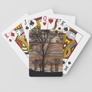 Silhouette von Waldbaum an der Stallbehörde Spielkarten