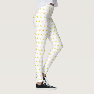 Silhouetten von kleinen gelben Bananen auf weißen Leggings