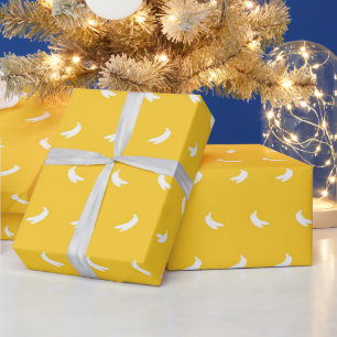 Silhouetten von kleinen weißen Bananen auf Gelb Geschenkpapier