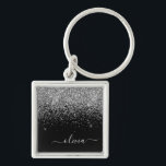 Silver Black Glitzer Script Monogram Girenname Schlüsselanhänger<br><div class="desc">Silver und Black Sparkle Glitzer Script Monogram Name Keychains (Key Chain). Das macht den perfekten 16 Geburtstag,  Hochzeit,  Brautparty,  Jubiläum,  Babydusche oder Junggeselinnen-Abschied Geschenk für jemanden,  der Lieben glamourösen Luxus und schicke Stile.</div>