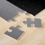 Silver Dog Paw auf schwarzem Hintergrund Puzzle (Seite)