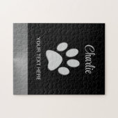 Silver Dog Paw auf schwarzem Hintergrund Puzzle (Horizontal)