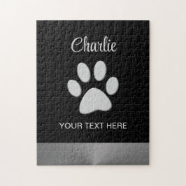 Silver Dog Paw auf schwarzem Hintergrund Puzzle