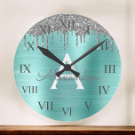 Silver Teal Glitter Brushed Metal Monogram Name Große Wanduhr<br><div class="desc">Silver and Teal Aqua Blue Scheinfoil Metallic Sparkle Glitter Brushed Metal Monogram Name and Initial Luxury Wall Clock. This makes the perfect sweet 16 birthday,  wedding,  bridal shower,  anniversary,  baby shower or bachelorette party gift for someone that loves glam luxury and chic styles.</div>