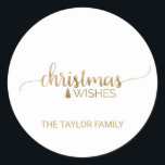 Simple Gold Calligraphy Christmas Runder Aufkleber<br><div class="desc">Diese einfachen goldkalligraphischen Weihnachtsaufkleber sind perfekt für eine schicke Urlaubskarte oder ein Geschenk. Das elegante Design besticht durch einen luxuriösen Imitat mit goldenen Pinselstrichen-Schriftart, der "Weihnachtswünsche" und einen kleinen Weihnachtsbaum ausliest. Personalisieren Sie die Aufkleber mit Ihrem Namen. Bitte kontaktieren Sie mich mit beliebigen Designanpassungen, die Sie benötigen. Bitte beachten Sie:...</div>