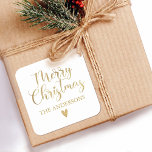 Simple Gold Merry Christmas Calligraphy Script Quadratischer Aufkleber<br><div class="desc">Ein edles Gold Frohe Weihnachtsaufkleber mit hübscher Schriftzypografie. Personalisieren Sie es mit Ihrem Namen. Entworfen für Sie von BlackBerry Boulevard.</div>