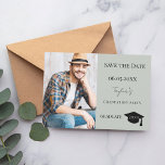 Simple modern photo sage green guy Graduation Save The Date<br><div class="desc">A photo Save the date card for a graduation. On front: Add your own vertical size photo of the graduate. A trendy muted sage green colored background, black text. Templates for a name and date. The name is written with a modern hand lettered style script. With a cap, tassel topper....</div>