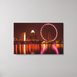Singapore Flyer Wheel bei Nacht mit Skyline-Leinwa Leinwanddruck