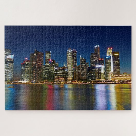 Singapur Skyline bei Nacht mit Licht auf Wasser Puzzle (Horizontal)