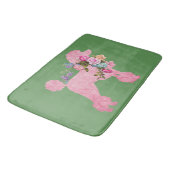 Single Pink French Poodle auf Grün Badematte (Schrägansicht)