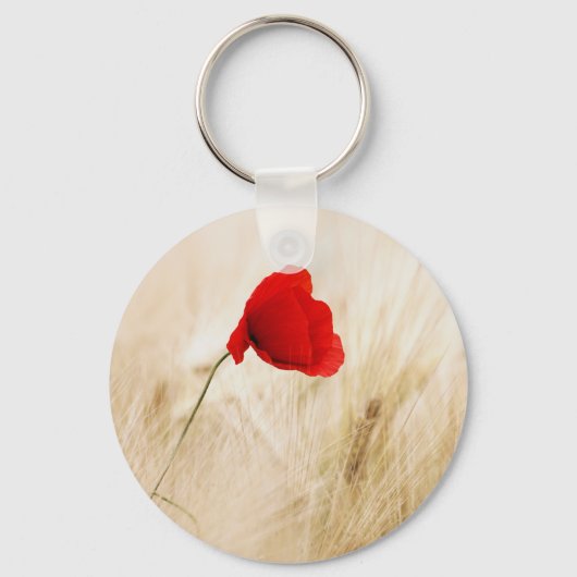 Single Roter Mohn auf einem grasbewachsenen Feld Schlüsselanhänger (Vorderseite)