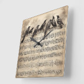 Singvögel auf einer musikalischen Komposition Quadratische Wanduhr (Winkel)