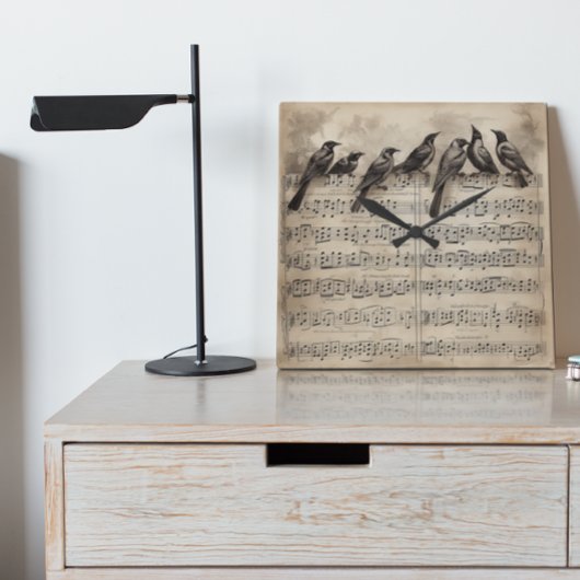 Singvögel auf einer musikalischen Komposition Quadratische Wanduhr