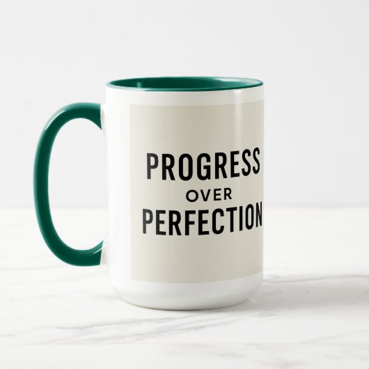 Sip Erfolg: Fortschritt über Perfektion Tasse (Links)