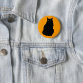 Sitzende schwarze Katze auf Orange Button (Beispiel)