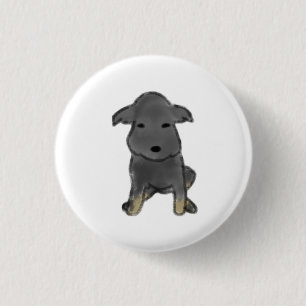 Sitzender Kohlewelpe mit braunen Pfoten Geschenk Button
