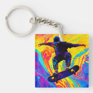Skateboard durch Farben Schlüsselanhänger