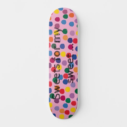 Skateboard mit bunten Punkten und rosa Hintergrund (Vorderseite)