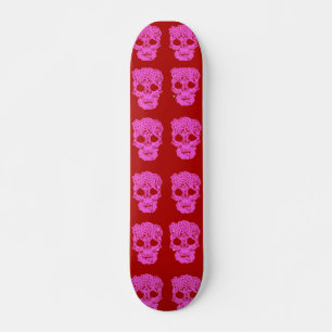Skateboard mit rotem und rosa Krokett