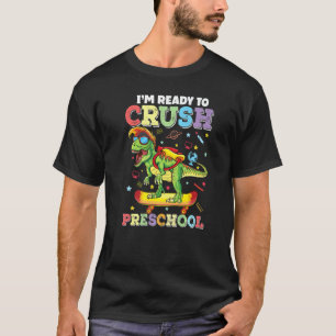 Skateboarding-Dinosaur zerquetscht Vorschule zurüc T-Shirt