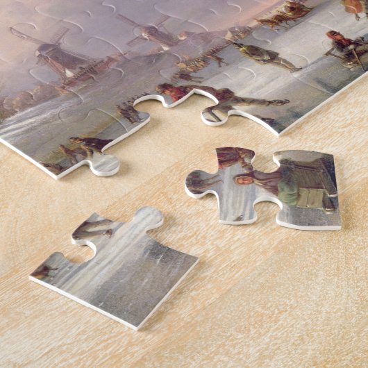 Skater auf einem gefrorenen Fluss vor Windmühlen Puzzle (Seite)