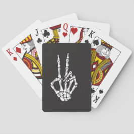 Skeleton Hand macht ein Friedenszeichen auf einem  Spielkarten