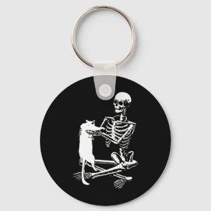 Skeleton mit einem katzenartigen Halloween-Kostüm  Schlüsselanhänger