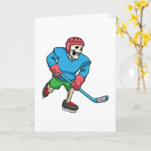 Skelett beim Eishockey mit Eishockeyschläger Karte (Gelbe Blume)