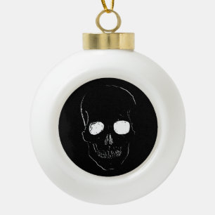 Skelett mit leuchtenden Augen auf einem Keramik Kugel-Ornament