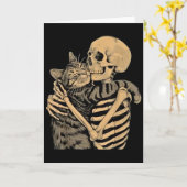 Skelett umarmende Katze – Süßes Gothic-Katzengesch Karte (Gelbe Blume)