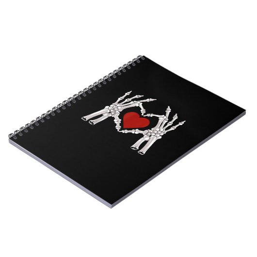 Skeletthandschuhe formen ein Herz mit rotem Herzen Notizblock (Linke Seite)
