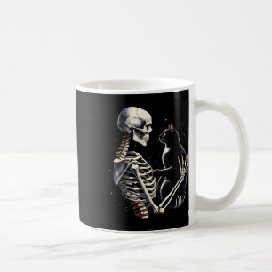 Skelettspielen mit einer katzengrafischen Katzenha Kaffeetasse