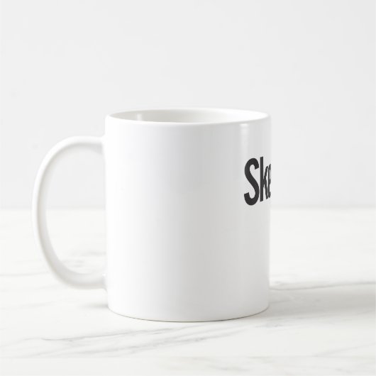 Skeptiker mit einer k-Tasse Kaffeetasse (Links)