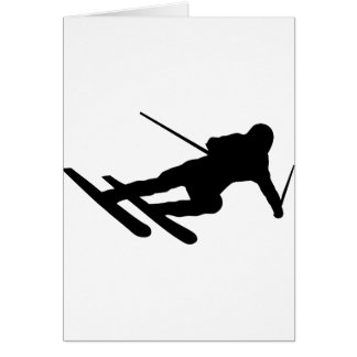 Ski fahrender abschüssiger Skifahrer des Skis