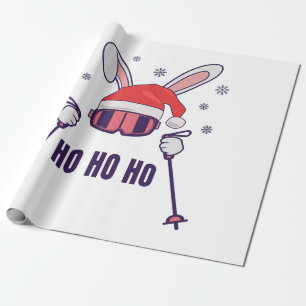 Ski Santa Rabbit mit Weihnachtsmannmütze und Skist Geschenkpapier