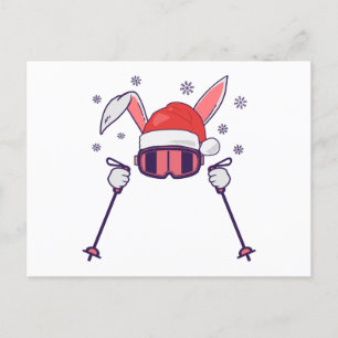 Ski Santa Rabbit mit Weihnachtsmannmütze und Skist Postkarte