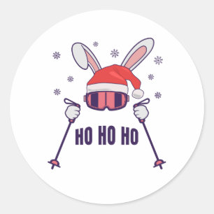 Ski Santa Rabbit mit Weihnachtsmannmütze und Skist Runder Aufkleber