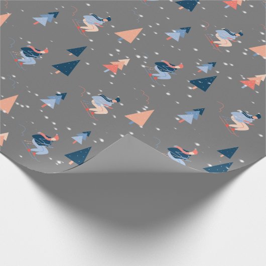 Skifahrer in Schneeflocken auf Grau Geschenkpapier (Ecke)