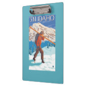 Skifahrer-tragende Schnee-Skis - Idaho Klemmbrett (Links)