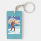 Skifahrer-tragende Schnee-Skis - Montana Schlüsselanhänger (Rückseite)