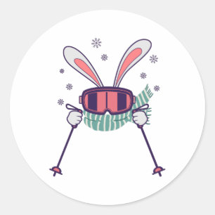 Skihasen mit Skistöcken und Schal Runder Aufkleber