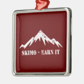 Skimo, verdiene es ornament aus metall (Links)