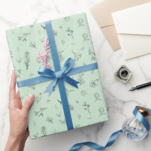 Skizzierte Wildblumen auf Hellgrün Geschenkpapier