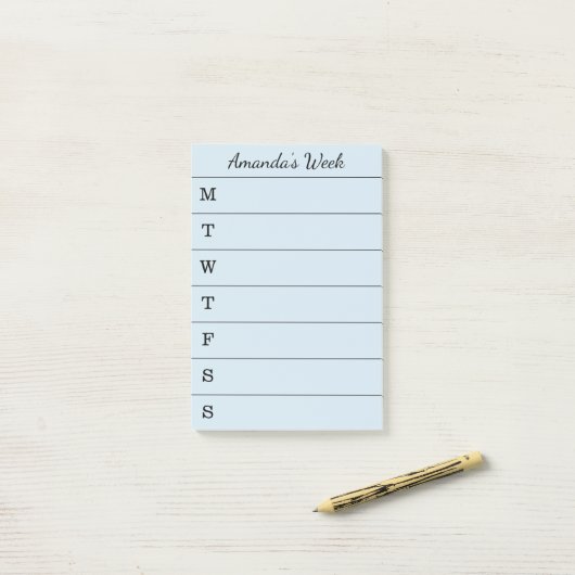 Skript-hellblaue Namenswochenzeitung, zum der Post-it Klebezettel (Auf Schreibtisch)