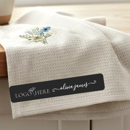 Skript-Logo und schwarze Textil-Bekleidung Etiketten