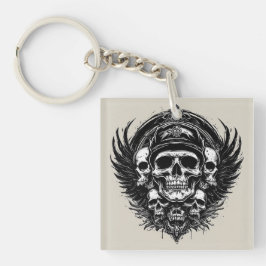 Skull-Design mit Flügeln und Symbolen Schlüsselanhänger