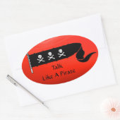 SKULLS UND KREUZELN ROTE SCHWARZE PIRATFLAGE OVALER AUFKLEBER (Umschlag)