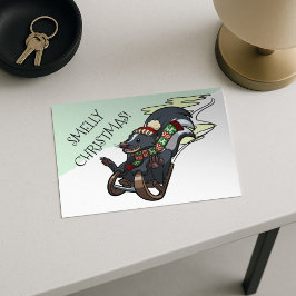 Skunk on a Sled Smelly Christmas Sledging Cartoon Feiertagspostkarte