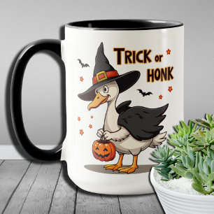 Skurril lustiger Halloween-Enten-Kostüm-Trick oder Tasse