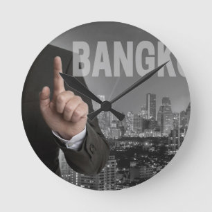 Skyline von Bangkok in der Nacht Runde Wanduhr